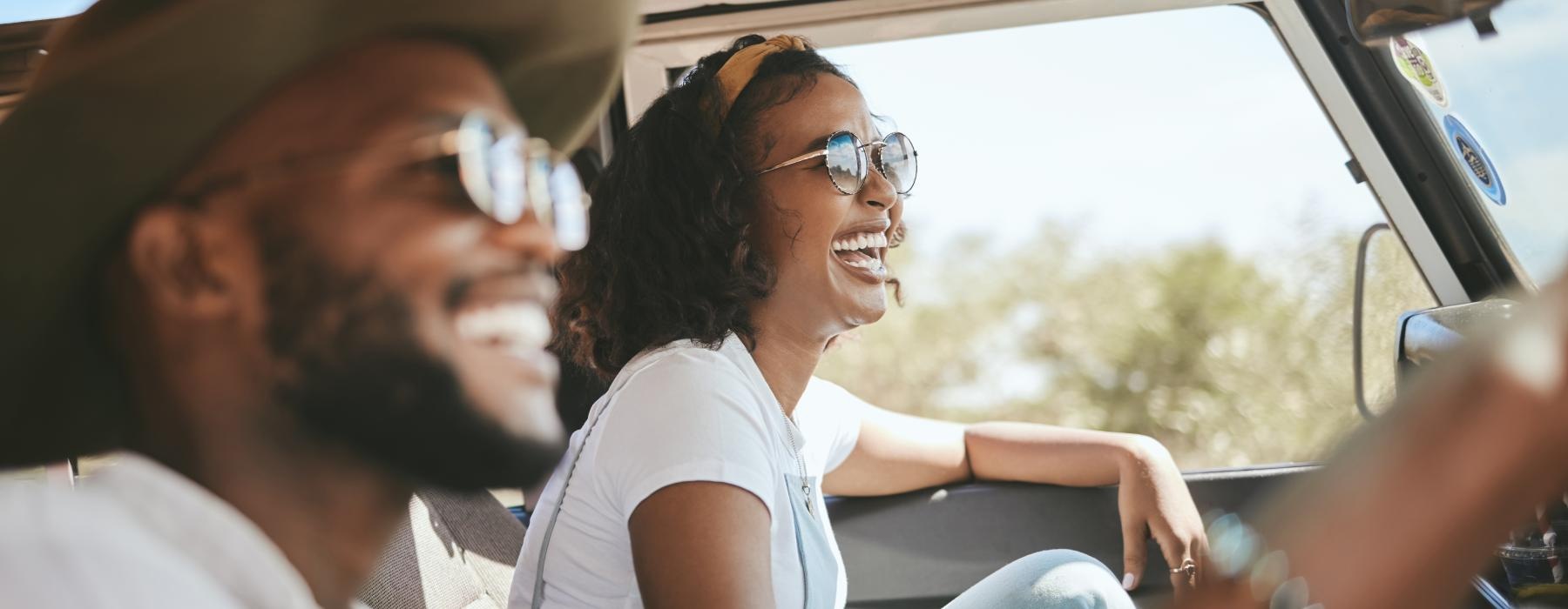 a man and woman in a car