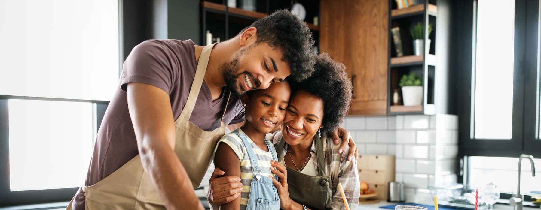 a family cooking in a kitchen