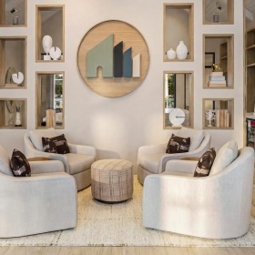 a lounge area with chairs