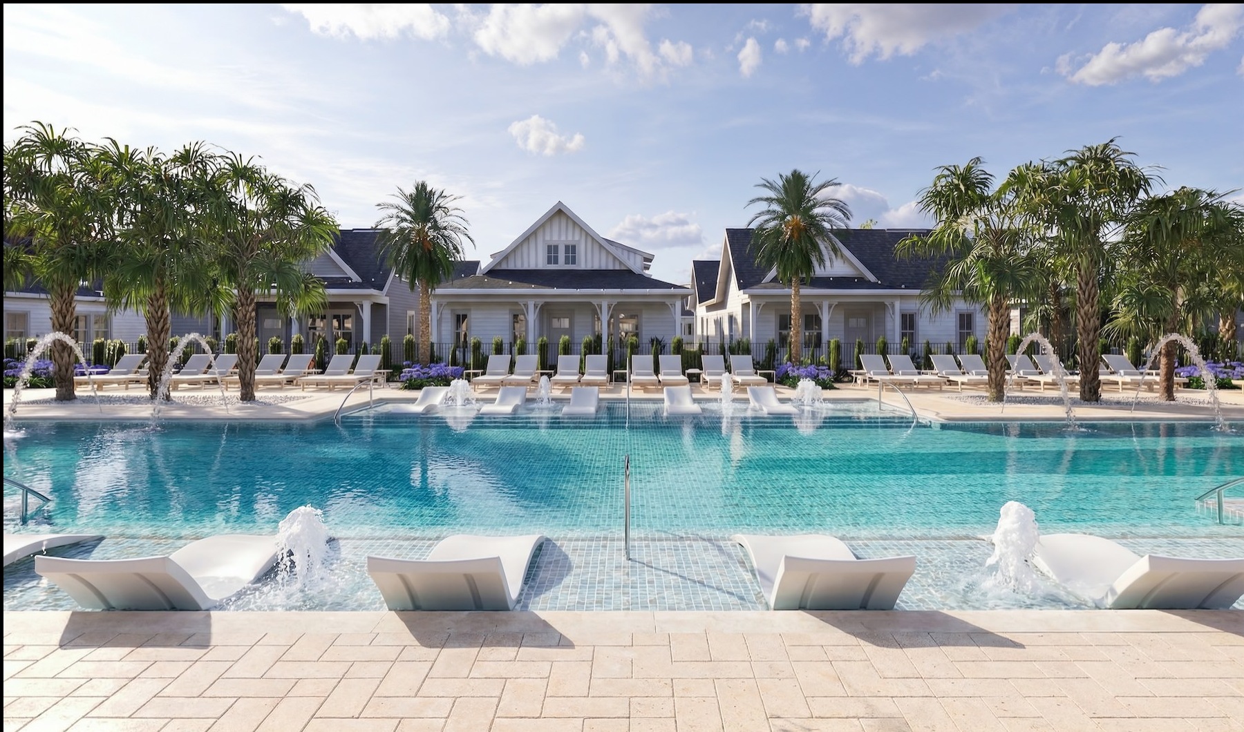 a swimming pool with lounge chairs