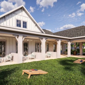 a cornhole area in front of a building